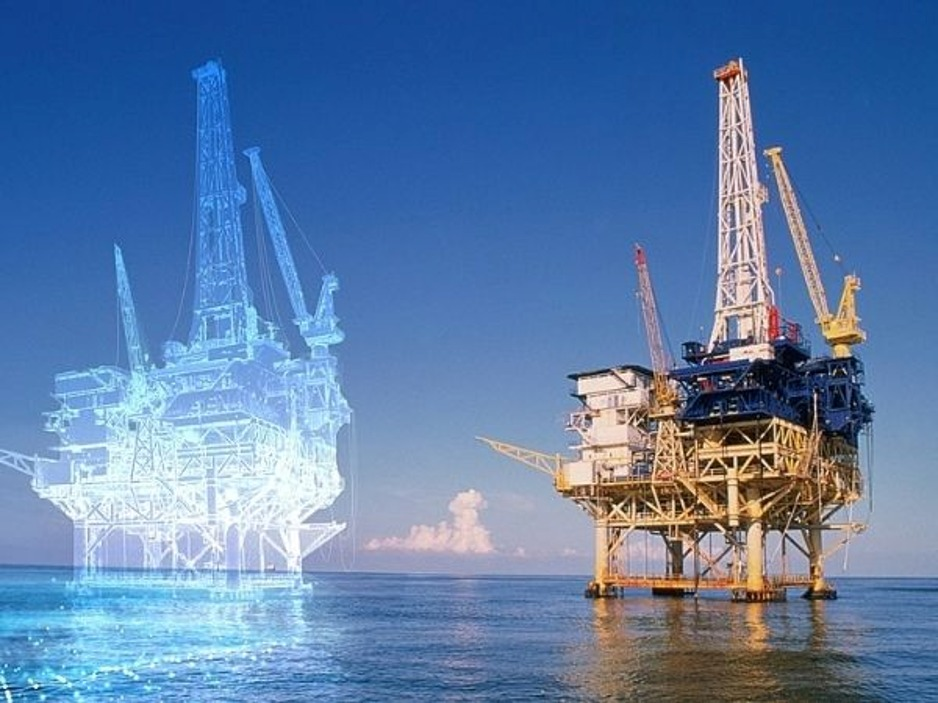 Digital twin wireframe overlaid on a real offshore platform